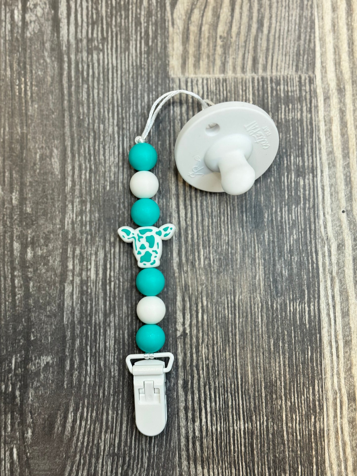 Teal Cow Pacifier Clip