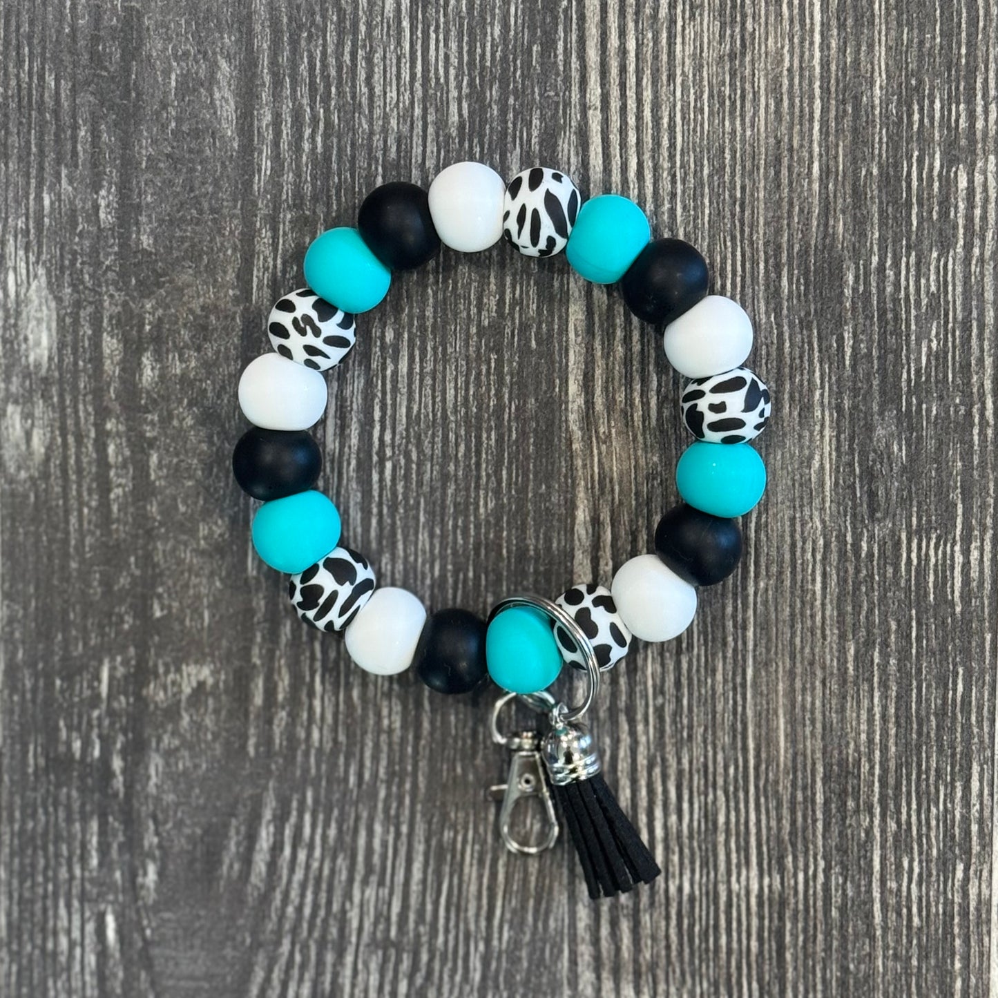 Turquoise and Cow Print Wristlet